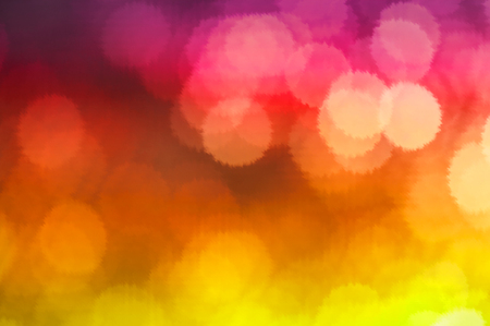 Colorful blurred light bokeh of honeycomb, made with color filter.の写真素材