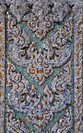 The walls are decorated with broken tiles の写真素材
