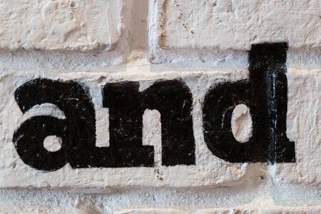 Beautiful white brick wall in the restaurant. Have letters and words.の写真素材