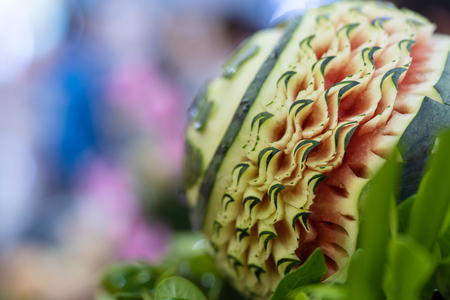 Thai fruit carving is a traditional. Thai art that requires neatness, precision, meditation, and personal ability. Fruit carving persisted in Thailand as a respected art for centuries.の写真素材