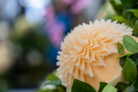 Thai fruit carving is a traditional. Thai art that requires neatness, precision, meditation, and personal ability. Fruit carving persisted in Thailand as a respected art for centuries.の写真素材