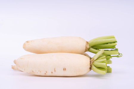 Fresh white radish isolated on white background.の写真素材
