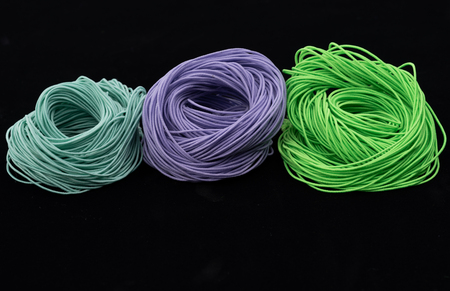 Rope, Colorful rubber rope. Twisted rope beautifully on a black background.の写真素材