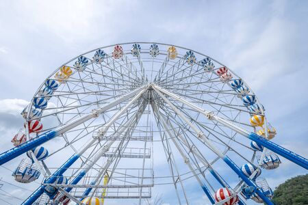 Ferris Wheel, low angle view of a big Ferris Wheelの写真素材