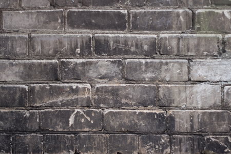 An old weathered brick wall with grungy textureの写真素材