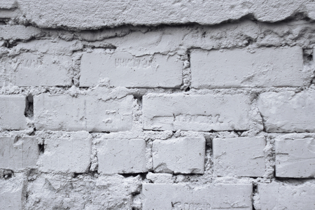 An old weathered brick wall with grungy textureの写真素材