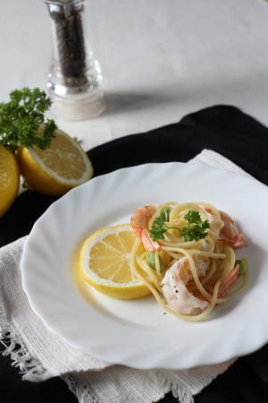 Spaghetti shrimp  with basil in plateの写真素材