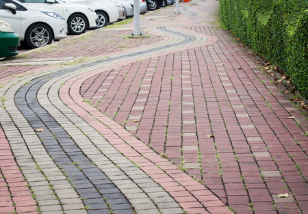 footpath pavement sidewalk with traffic signの写真素材