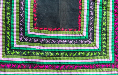 Colorful Thailand style rug surface close up vintage fabric is made of hand-woven cotton fabric More...