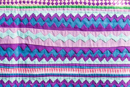 Colorful Thailand style rug surface close up vintage fabric is made of hand-woven cotton fabric More...