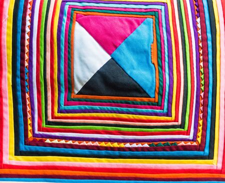 Colorful Thailand style rug surface close up vintage fabric is made of hand-woven cotton fabric More...