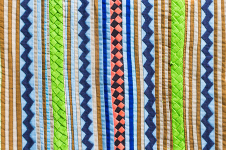Colorful Thailand style rug surface close up vintage fabric is made of hand-woven cotton fabric More of this motif , backgroundの写真素材