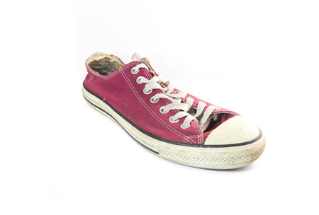 vintage red shoes on white backgroundの写真素材