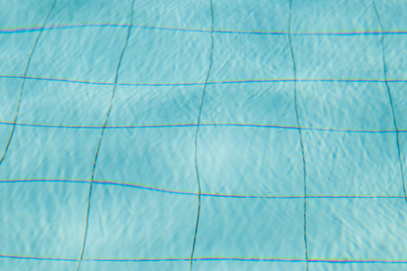 Blue ripped water in swimming pool.