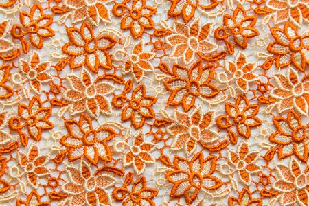Orange lace on white background. No any trademark or restrict matter in this photo.の写真素材