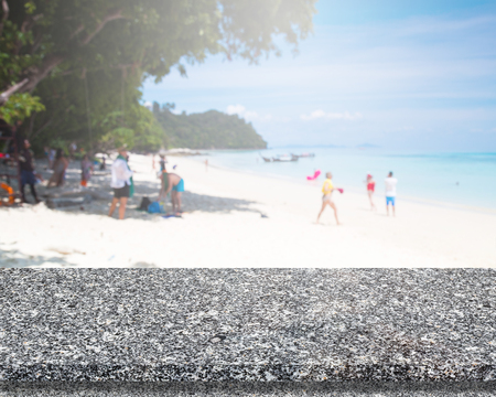 Marble Stone Table Top And Blur Background Of The Beach.の写真素材