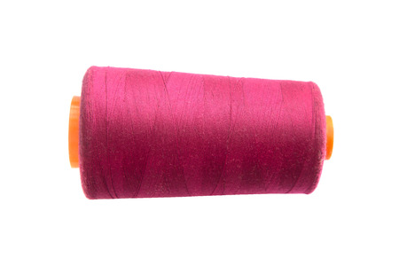 Spool of thread isolated on white background.