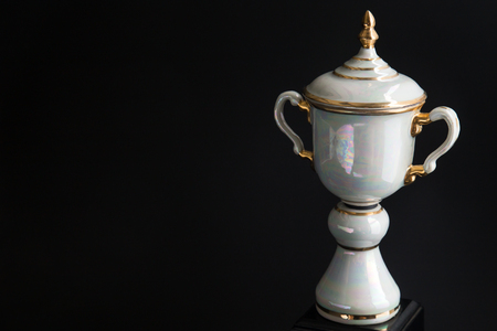 Close up of Marble trophy over black background. Winning awards with copy space for text and design.の写真素材