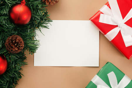 Merry christmas greeting card mockup template with christmas gifts decorations.の写真素材