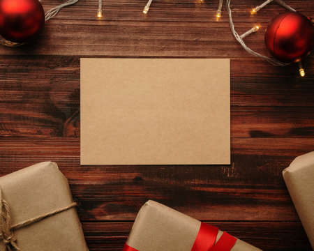 Merry christmas greeting card mockup template with christmas gifts decorations.の写真素材