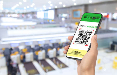 Vaccine digital passport on smartphone screen as proof that the holder has been vaccinated against...