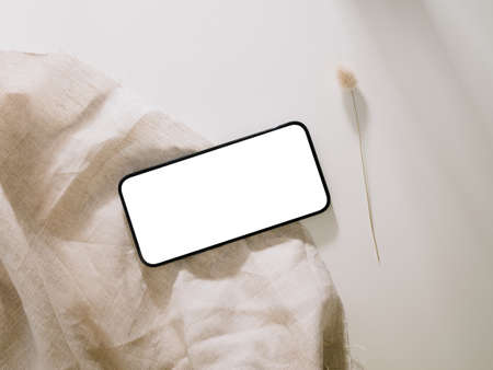 Smartphone mockup, Phone with blank screen template. Flat lay, Minimalist styled.