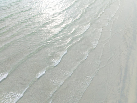 Aerial drone view of beautiful beach with turquoise sea water of Gulf of Thailand. Kood island,...