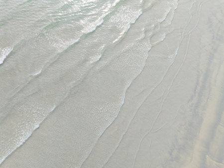 Aerial drone view of beautiful beach with turquoise sea water of Gulf of Thailand. Kood island,...