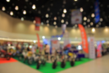 blurred image of motor show,show room,motor expo for backgroundの写真素材