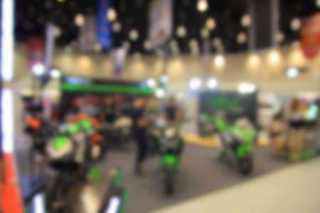 blurred image of motor show,show room,motor expo for backgroundの写真素材