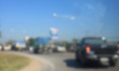 blurred image trucks on the freeway