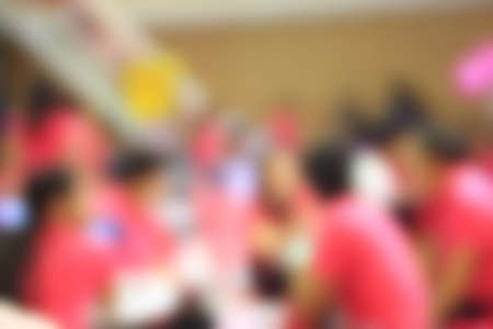 Businessmen and women blur in  work conferenceの写真素材