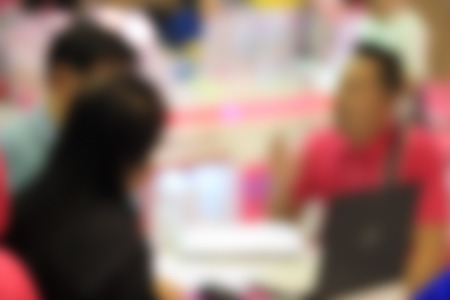 Businessmen and women blur in  work conferenceの写真素材