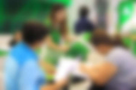 Businessmen and women blur in  work conferenceの写真素材