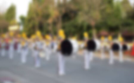 blur photo background of marching band in parade