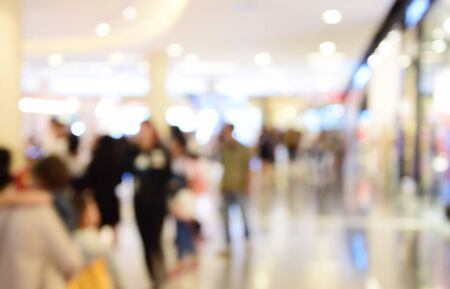 blurred image  people in shopping mall with bokehの写真素材