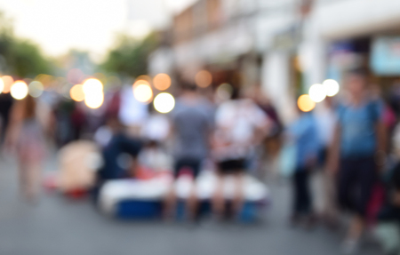 blurred image people walking street marketの写真素材