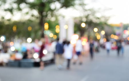 blurred image people walking street marketの写真素材