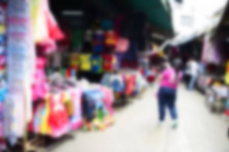 blurred image people walking street marketの写真素材
