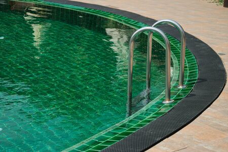 ladder in the swimming poolの写真素材