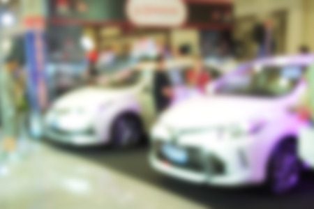 blurred image abstract motor show show room motor expo for backgroundの写真素材