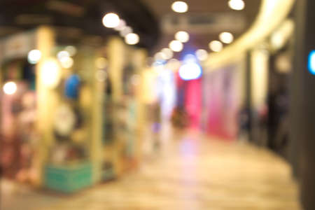 blurred image people in shopping mall with bokehの写真素材