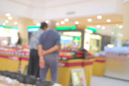 blurred image people in shopping mall with bokehの写真素材