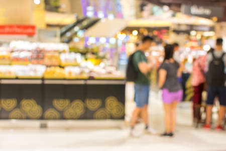 blurry image people man and woman waiking in shoppingmallの写真素材