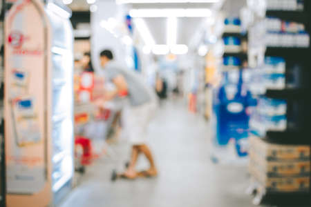 Blurred image  abstract people shopping in supermarket interior for backgroundの写真素材