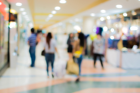 blurred image people in shopping mall with bokehの写真素材