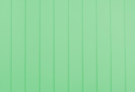 close-up of green window blind