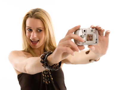 Beautiful girl takes a self portraitの写真素材