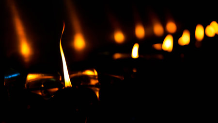 candlelight on black background for important day in buddhism or occasionsの写真素材