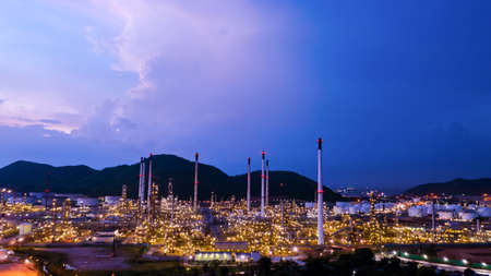 twilight time refinery oil and gas products storage tank chonburi province Thailand and blue sky background drone shotの写真素材
